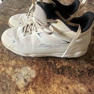 DSG Boy’s White baseball cleats.